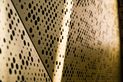 Champagne Gold perforated metal panels by Arrow Metal.