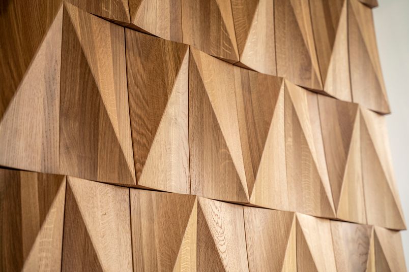 Evove Rise's geometric simplicity emphasizes the natural topography of timber.