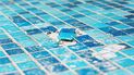 Glass versus ceramic pool tiles: Looks, prices and pitfalls
