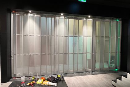 Commercial sliding doors at Platypus Shoes
